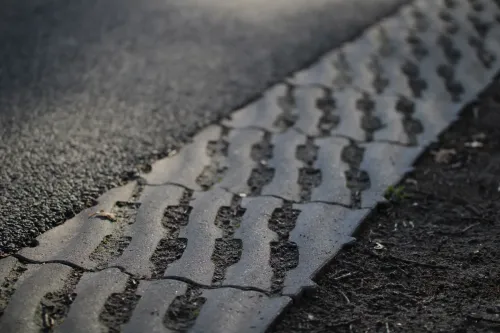 Grasbetontegel type M 40x40x12(meander) rondom hol-dol verbinding K85910 BK25-Groene estethiek